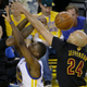 Harrison Barnes drives to the hoop. (Photo credit: Eric Risberg/AP)